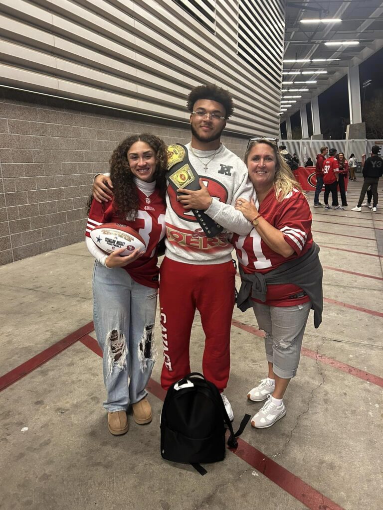 Jennifer Guerendo with her son Isaac after one of his games